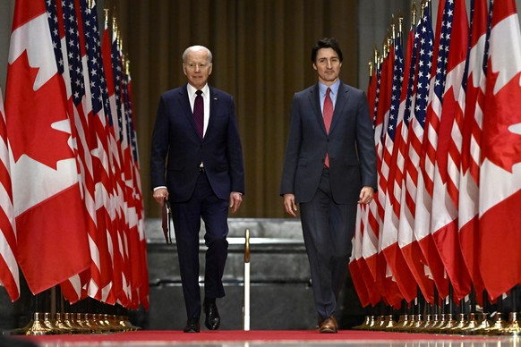 President Joe Biden and Canadian Prime Minister Justin Trudeau arrive for a joint press conference in Ottawa, Friday, March 24, 2023. (Justin Tang/The Canadian Press via AP)