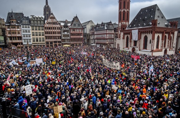 People gather as they protest against the AfD party and right-wing extremism in Frankfurt/Main, Germany, Saturday, Jan. 20, 2024. (AP Photo/Michael Probst)