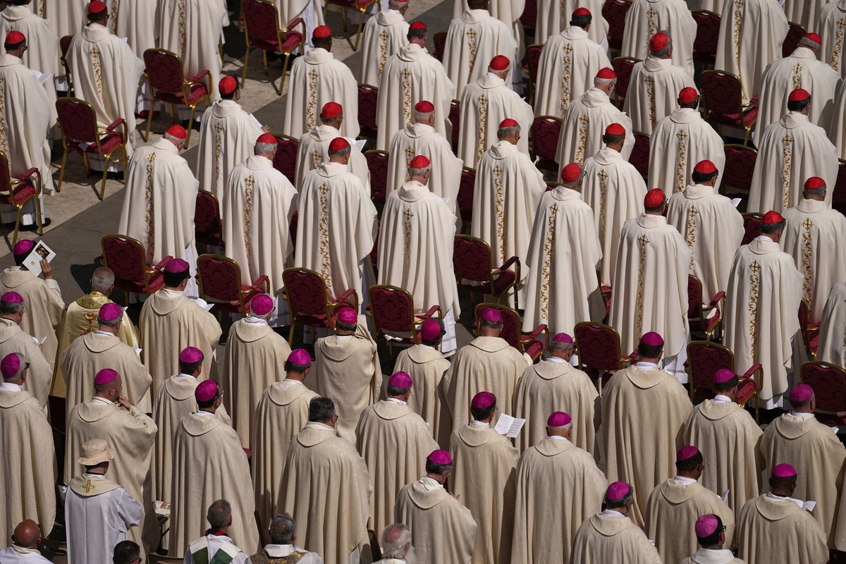 Cardinals and bishops attend a mass presided over by Vatican Secretary of State, Cardinal Pietro Parolin on the second of nine days of mourning for late Pope Francis in St. Peter's Square, at the ...