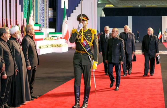 epa13083862 Deputy Chairman of the Russian Security Council Dmitry Medvedev (C) attends a state funeral ceremony for late Iranian Supreme Leader Ayatollah Ali Khamenei, who was killed in a joint US an ...