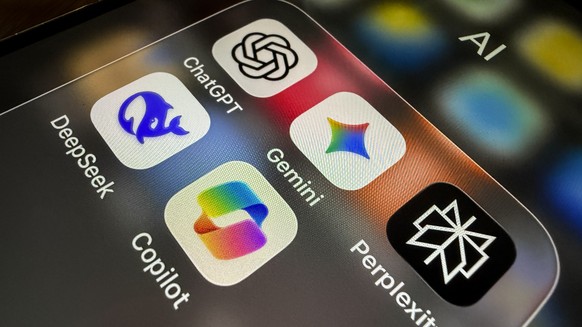 epa12494853 (ILLUSTRATION) - A mobile phone display showing the icons of artificial intelligence (AI) apps Deepseek, Chatgpt, Copilot, Perplexity and Gemini in Berlin, Germany, 31 October 2025. EPA/HA ...