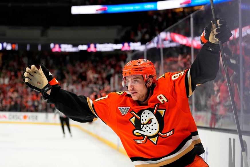 FILE - Anaheim Ducks center Leo Carlsson celebrates his empty net goal during the third period of Game 6 in the first round of the NHL hockey Stanley Cup playoffs series against the Edmonton Oilers, A ...