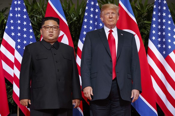 FILE - In this June 12, 2018, file photo, U.S. President Donald Trump, right, meets with North Korean leader Kim Jong Un on Sentosa Island, in Singapore. North Korea on Friday, June 12, 2020 again vow ...