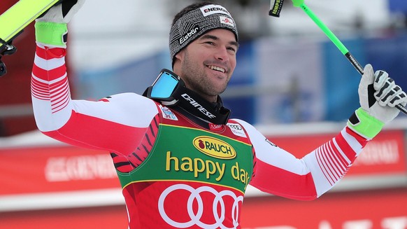 epa08083714 Winner Vincent Kriechmayr of Austria celebrates in the finish area of the Men's Super-G race at the FIS Alpine Skiing World Cup event in Val Gardena, Italy, 20 December 2019. EPA/ANDR ...