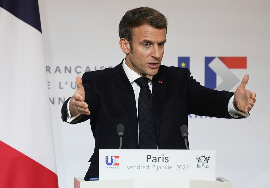 epa09671724 French President Emmanuel Macron speaks during a joint press conference with European Commission President Ursula von der Leyen (not pictured) after a meeting at the Elysee Palace in Paris ...