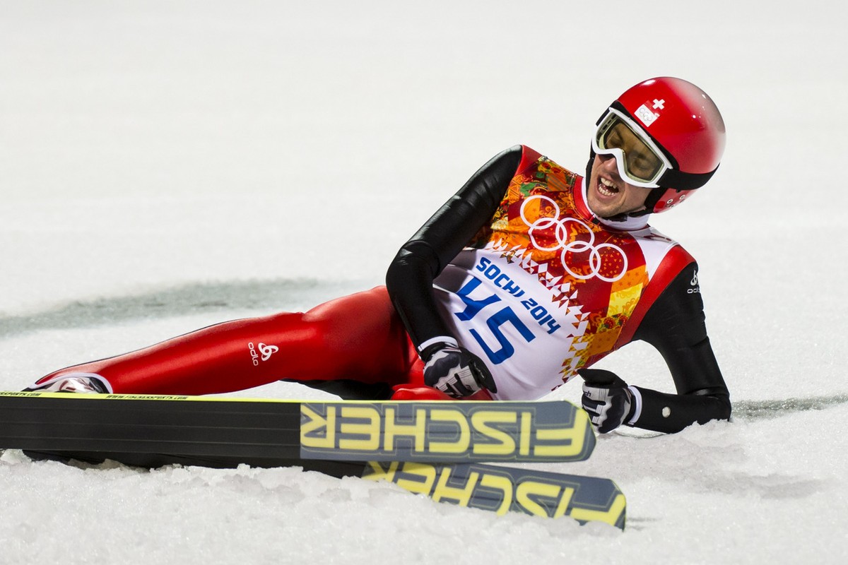 Simon Ammann of Switzerland reacts during the final round of the men's ski jumping NH competition at the XXII Winter Olympics 2014 Sochi at the RusSki Gorki ski jumping center in Krasnaya Polyana ...