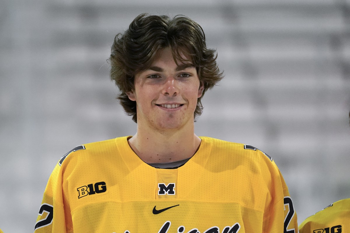 University of Michigan defenseman Owen Power smiles during an NCAA college hockey practice in Ann Arbor, Mich., Wednesday, Sept. 22, 2021. Owen Power passed on a chance to make millions this season wi ...