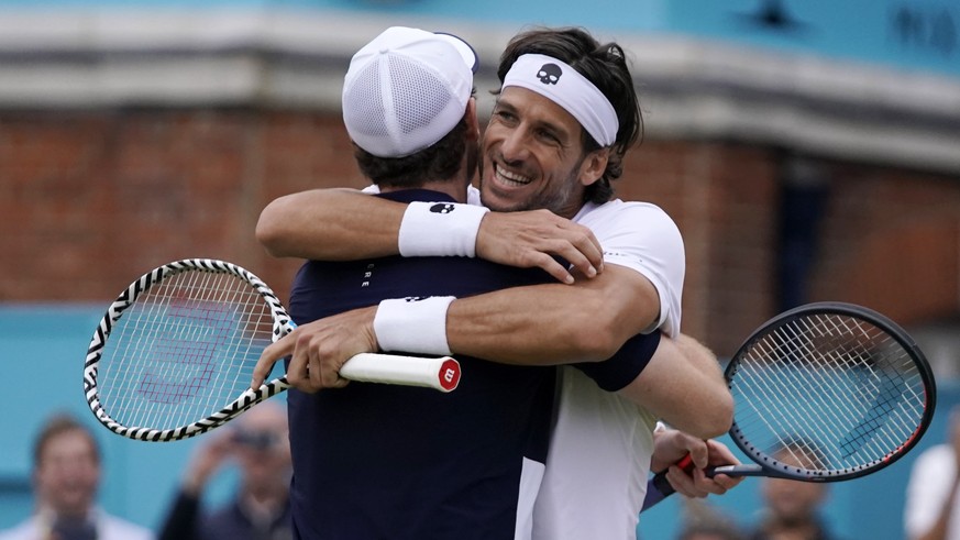 epa07669284 Britain&#039;s Andy Murray (L) celebrates with Feliciano Lopez of Spain (R) after winning their mens doubles final match against Britain&#039;s Joe Salisbury and Rajeev Ram at the Fever Tr ...