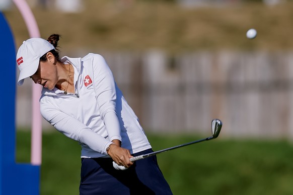 epa11536245 Albane Valenzuela of Switzerland tees the second hole during the second round of the Women Individual Stroke Play of the Golf competitions in the Paris 2024 Olympic Games, at the Le Golf N ...