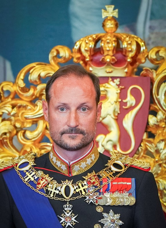 Norway's King Haakon attends a ceremony to take the Oath of Allegiance to the Constitution at the Norwegian Parliament, following the death of his father King Harald, in Oslo, Norway, September 1 ...