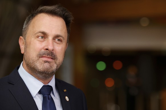 Luxembourg&#039;s Prime Minister Xavier Bettel talks to journalists as she arrives for an EU summit at the European Council building in Brussels, Friday, June 25, 2021. EU leaders are discussing the e ...
