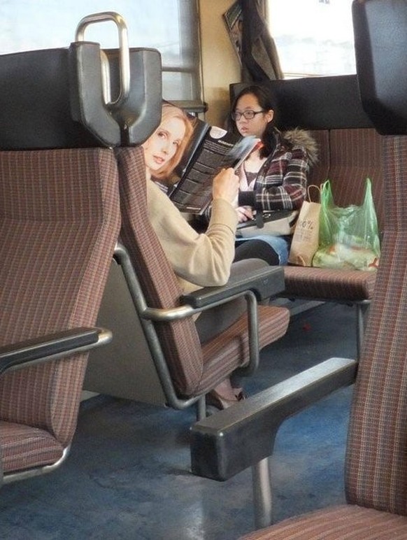 Book train optical illusion