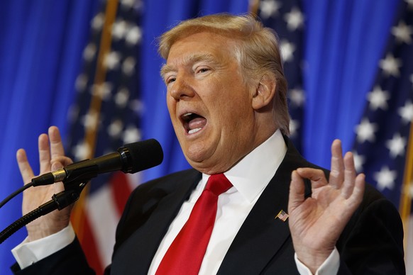 FILE - In this Jan. 11, 2017 file photo, President-elect Donald Trump speaks during a news conference in the lobby of Trump Tower in New York. Trump says his team will have a “full report on hacking w ...