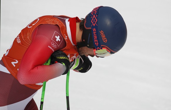 Switzerland&#039;s Carlo Janka reacts in the finish area after completing men&#039;s downhill training at the 2018 Winter Olympics in Jeongseon, South Korea, Saturday, Feb. 10, 2018. (AP Photo/Christo ...