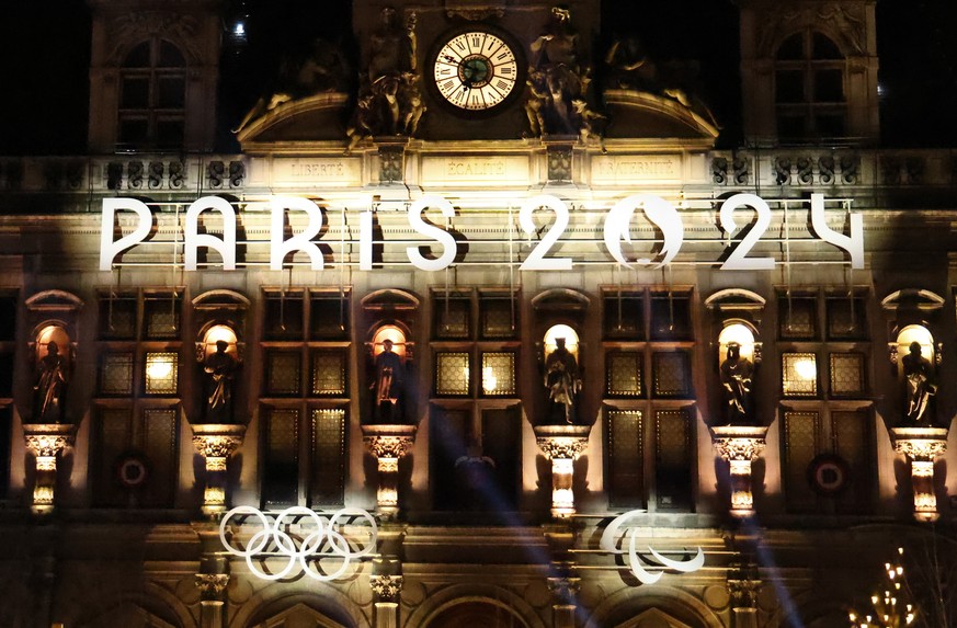 epa10999692 The front of Paris City Hall as it decorated with Olympic colours in Paris, France, 28 November 2023. Mayor of Paris Anne Hidalgo inaugurates the new look that City Hall will display until ...