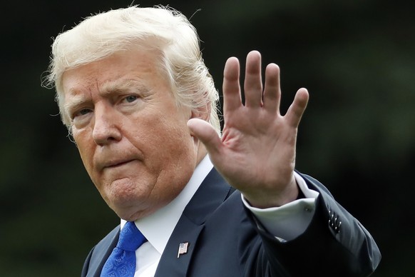 RETRANSMISSION TO CORRECT DATE - FILE - In this Sept. 20, 2018 file photo, President Donald Trump waves as he walks to Marine One on the South Lawn of the White House, in Washington. President Trump c ...