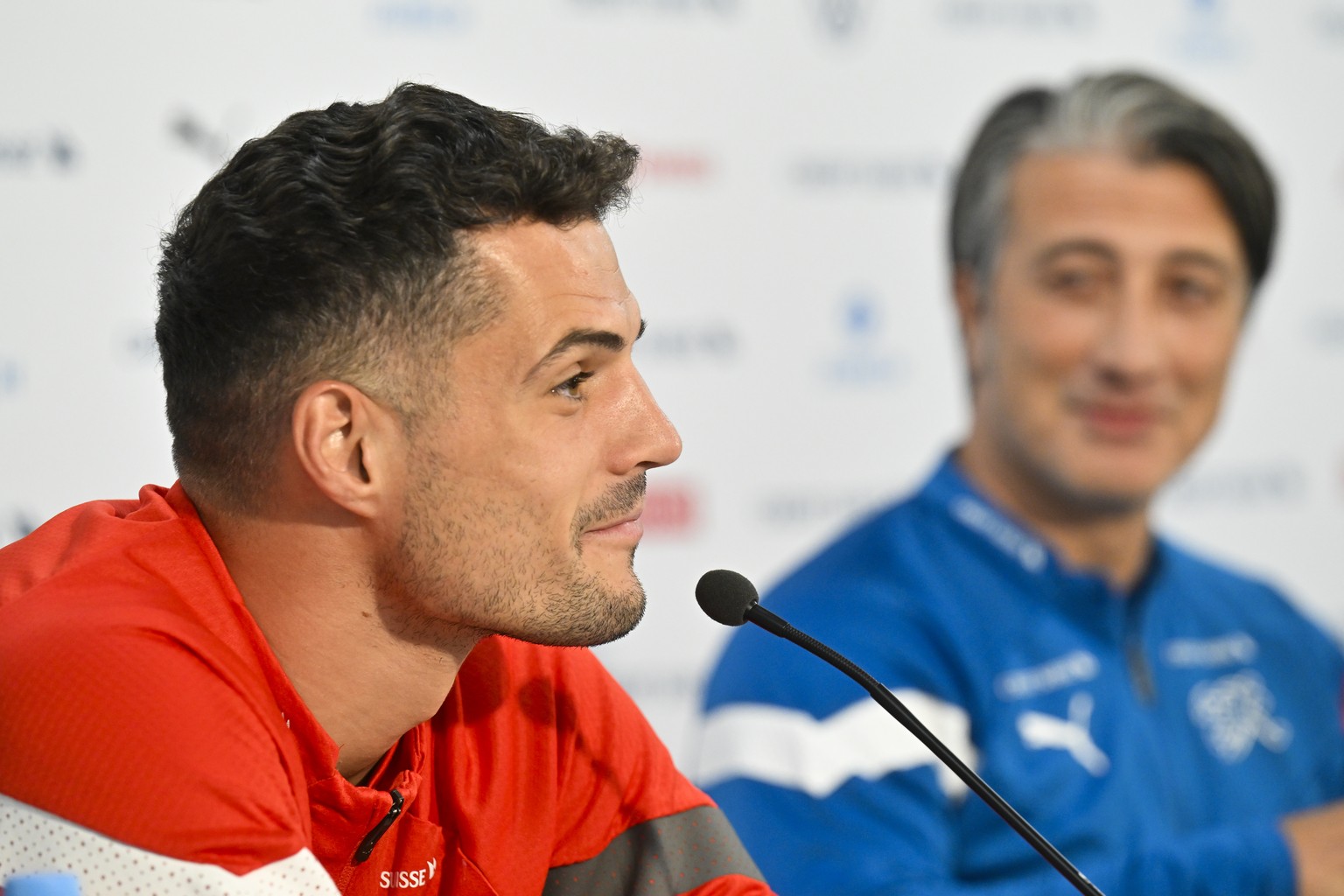 Granit Xhaka, left, and Head coach Murat Yakin of Team Switzerland during a press conference one day prior to the European Qualifiers 2024 against Belarus, on Friday, October 13, 2023, at the Kybunpar ...