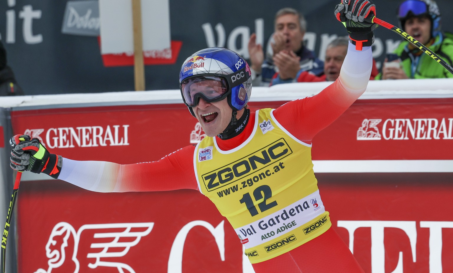 Switzerland&#039;s Marco Odermatt celebrates at the finish area of an alpine ski, men&#039;s World Cup downhill, in Val Gardena, Italy, Thursday, Dec.15, 2022. (AP Photo/Alessandro Trovati)