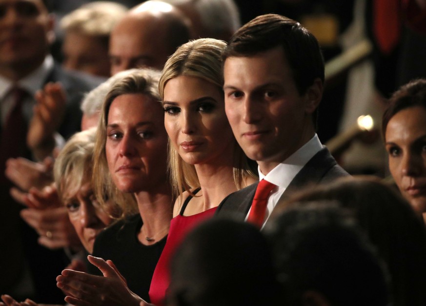 U.S. Trump Addresses Joint Session of Congress - Washington, U.S. 28/02/17 - Ivanka Trump (C), her husband Jared Kushner (R) and other guests, applaud another guest saluted by President Donald Trump d ...