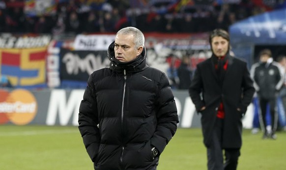 Chelsea&#039;s head coach Jose Mourinho and Basel&#039;s head coach Murat Yakin walk on the pitch prior to the UEFA Champions League group E group stage matchday 5 soccer match between Switzerland&#03 ...