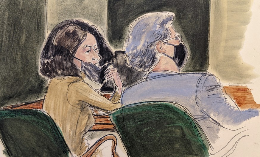 FILE - In this courtroom sketch, Ghislaine Maxwell, left, pulls down her mask to talk to one of her lawyers, Jeffrey Pagliuca, during Maxwell&#039;s sex trafficking trial, Monday, Dec. 27, 2021, in Ne ...