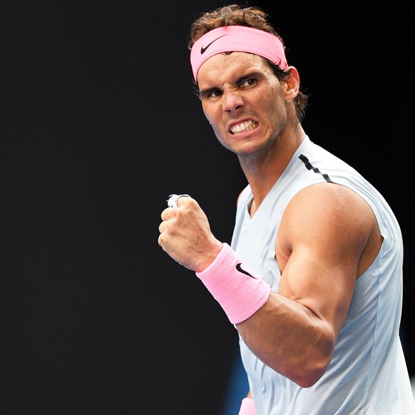 epa06459888 Rafael Nadal of Spain reacts during his fourth round match against Diego Schwartzman of Argentina at the Australian Open Grand Slam tennis tournament in Melbourne, Australia, 21 January 20 ...