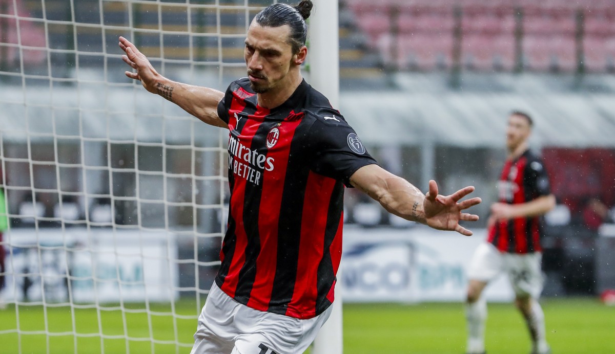 AC Milan's Zlatan Ibrahimovic celebrates after scoring the opening goal during the Serie A soccer match between AC Milan and Crotone at the San Siro stadium in Milan, Italy, Sunday, Feb. 7, 2021. ...