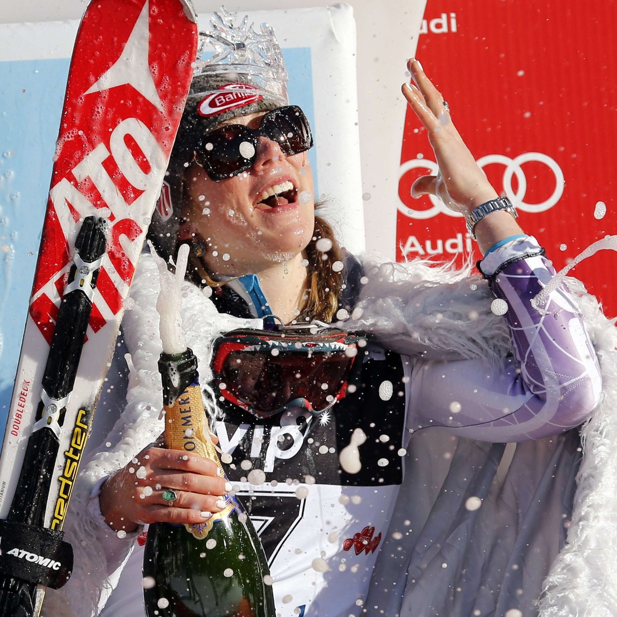 Mikaela Shiffrin from the U.S. celebrates on the podium after the World Cup Women's Slalom race on Sljeme in Zagreb January 4, 2015. REUTERS/Antonio Bronic (CROATIA - Tags: SPORT SKIING)