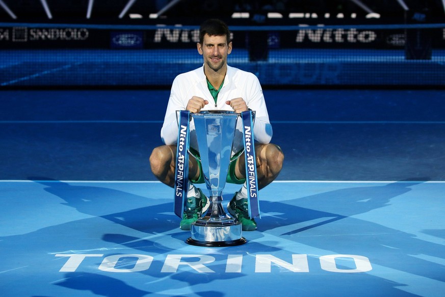 221121 -- TURIN, Nov. 21, 2022 -- Novak Djokovic of Serbia poses with his trophy during the awarding ceremony after winning the final match of the ATP, Tennis Herren Finals against Casper Ruud of Norw ...