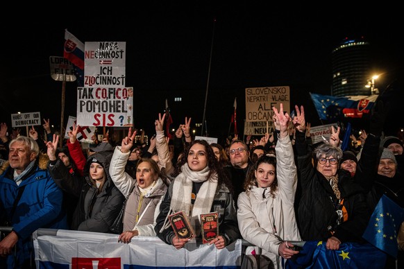 epa11850379 People take part in a demonstration against Slovak Prime Minister Fico&#039;s government in Bratislava, Slovakia, 24 January 2025. Thousands of protesters gathered in Bratislava to oppose  ...