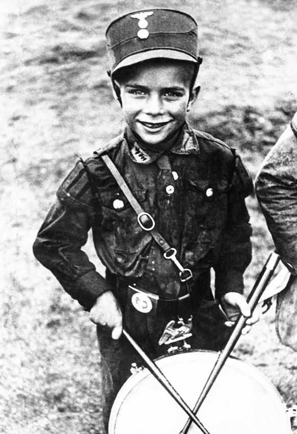 The great Hitler Youth meeting of southwestern Germany has taken place in Karlsruhe, Baden, May 17, 1933. This is smallest drummer boy of the Hitler Youth. (AP Photo) (KEYSTONE/AP/)