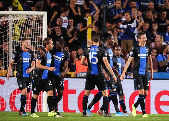 epa07800281 Players of Club Brugge celebrate their 2-1 lead during the UEFA Champions League playoff, second leg soccer match between Club Brugge and LASK in Bruges, Belgium, 28 August 2019. EPA/STEPH ...