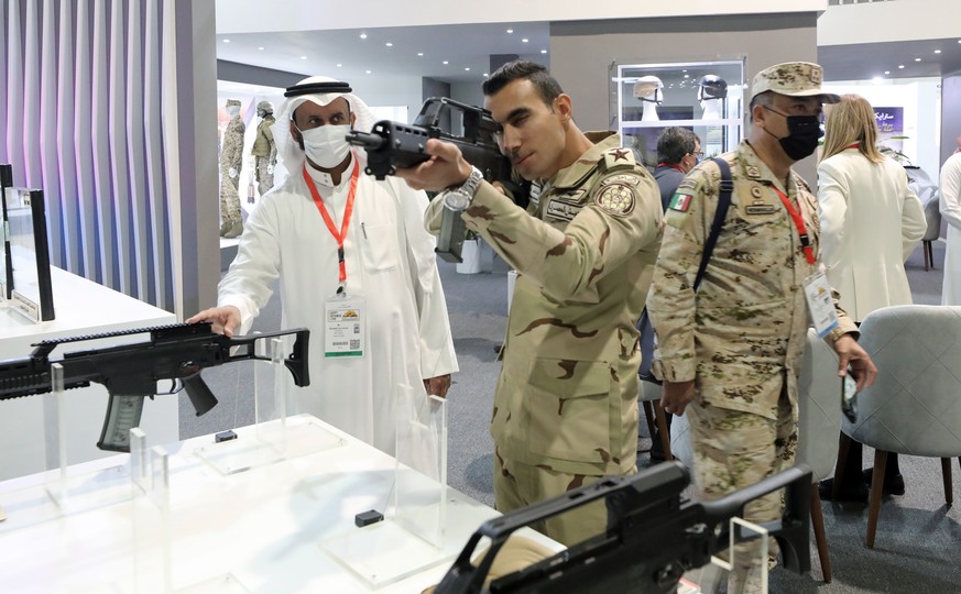 epa09612462 A soldier visits the EDEX Egypt Defence Exhibition 2021 at new Cairo, Egypt, 30 November 2021. Egypt Defense Expo (EDEX) 2021 is held from 29 November to 02 December 2021 with some 300 exh ...