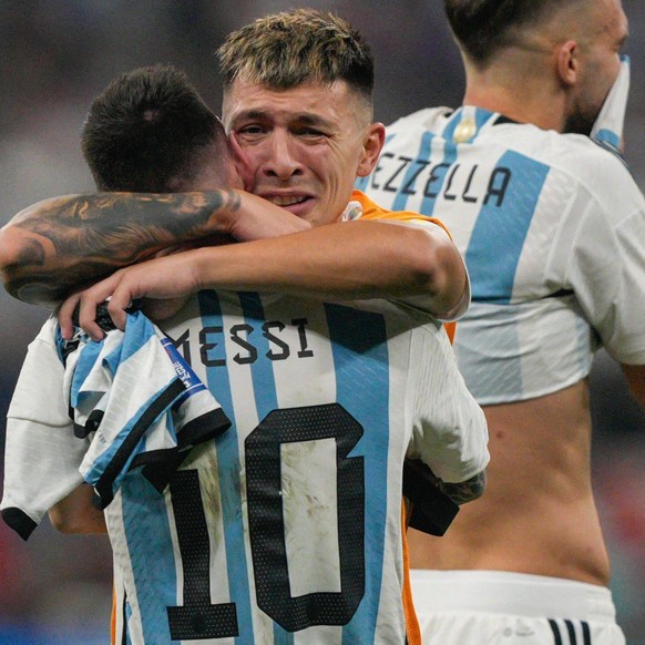 Mandatory Credit: Photo by Dave Shopland/Shutterstock 13670813ey Lisandro Martinez of Argentina hugs Lionel Messi of Argentina as they celebrate winning the FIFA World Cup, WM, Weltmeisterschaft, Fuss ...