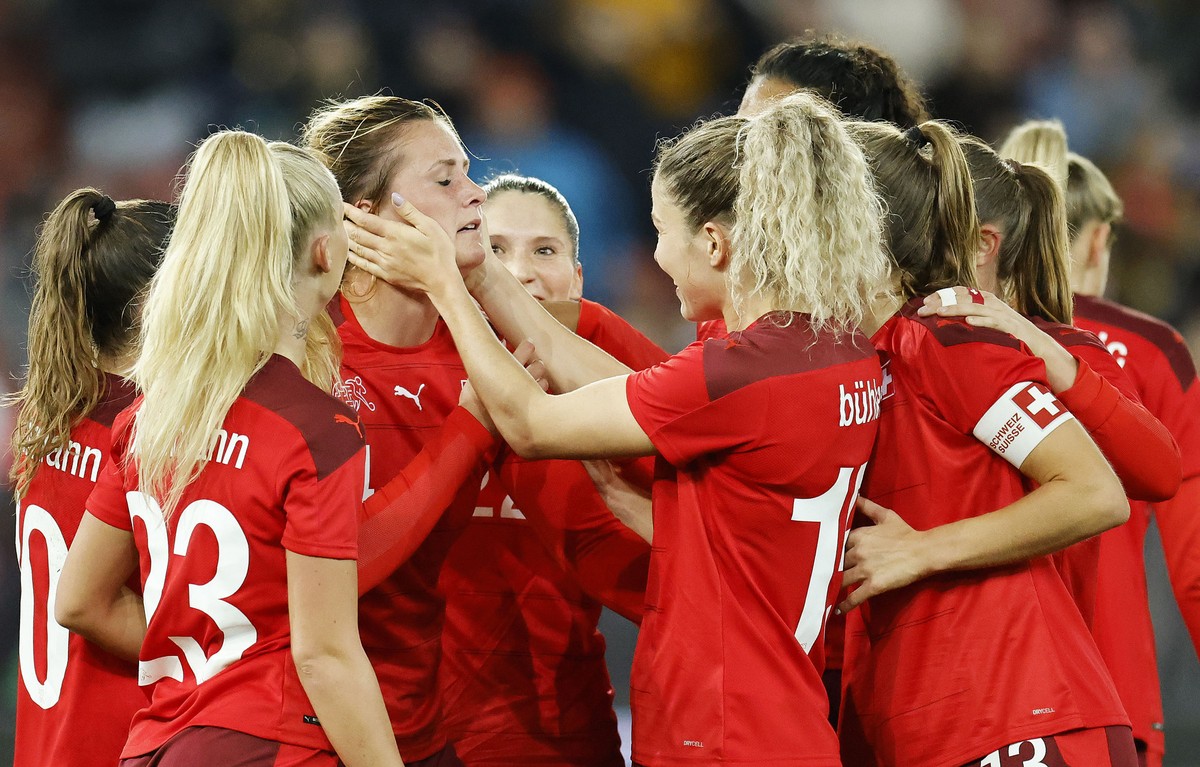 Switzerland's Rachel Rinast, 3rd left, celebrates with team mates after scoring her teams fourth goal during the FIFA Women's World Cup 2023 qualifying round group G soccer match between Swi ...