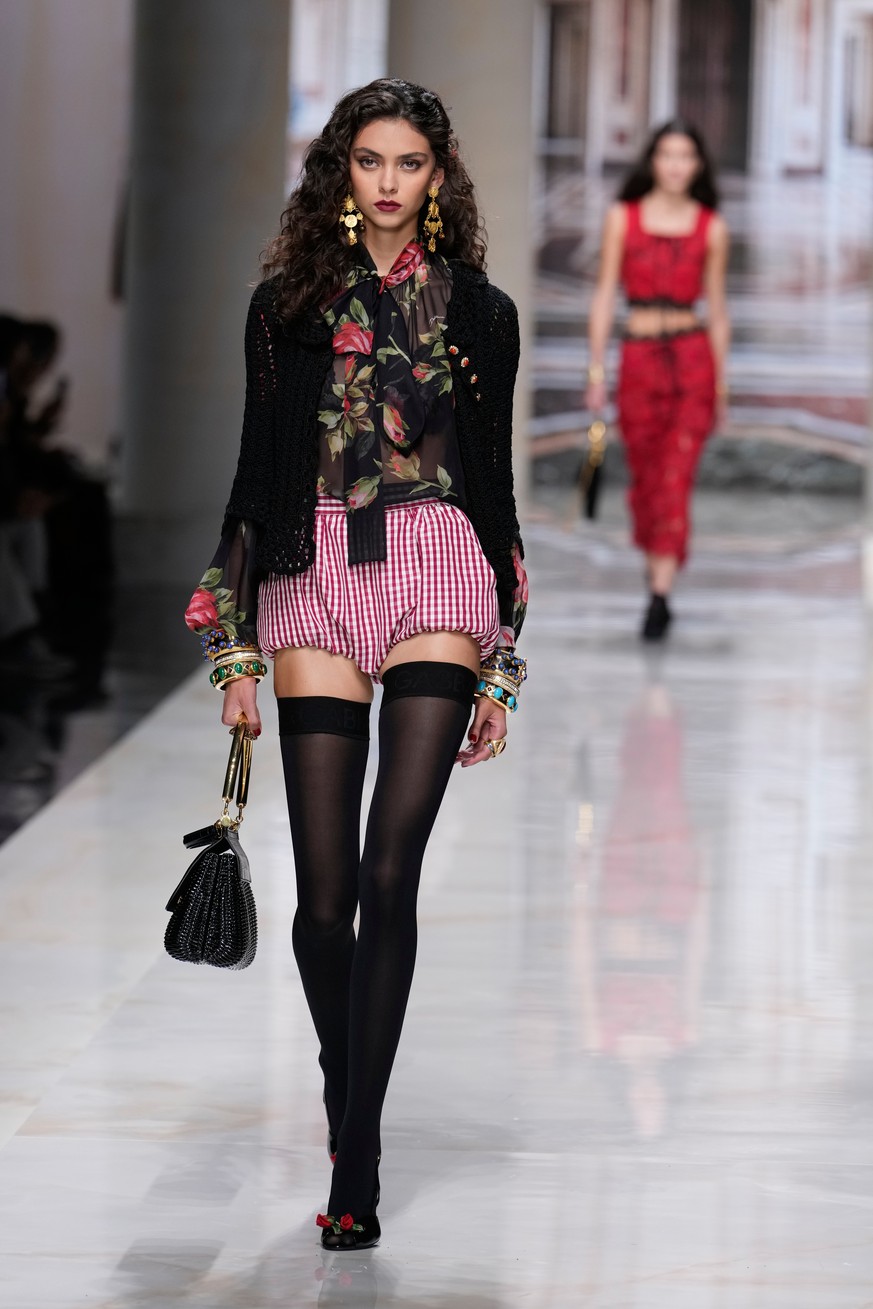 A model wears a creation part of Dolce &amp; Gabbana women's Spring-Summer 2027 collection, presented in Milan, Italy, Saturday, Sept. 26, 2026. (AP Photo/Luca Bruno)
Italy Fashion Dolce &amp; Ga ...