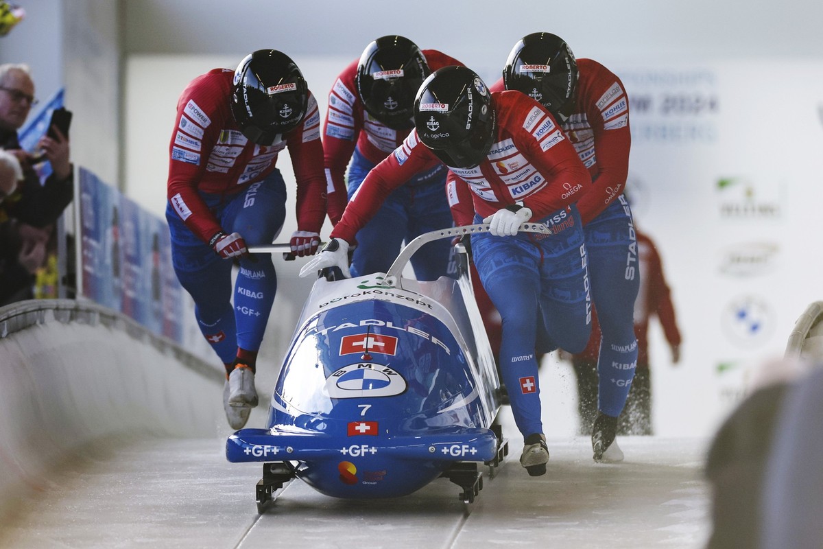epa11193035 Cedric Follador of Switzerland and his team in action during the first run of the four-man bobsleigh competition at the IBSF Bob and Skeleton World Championships in Winterberg, Germany, 02 ...