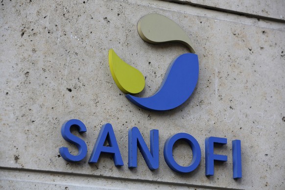 FILE - In this photo Nov.30, 2020 file photo the logo of French drug maker Sanofi is picture at the company&#039;s headquarters, in Paris. French drug maker Sanofi said Wednesday it will help manufact ...