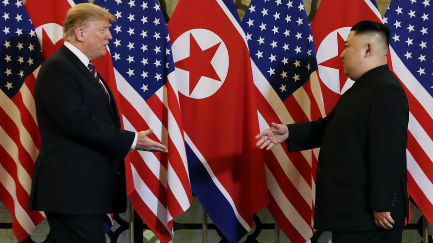 FILE - In this Feb. 27, 2019, file photo, President Donald Trump meets North Korean leader Kim Jong Un in Hanoi. North Korea has test-fired a "new-type tactical guided weapon," its state med ...