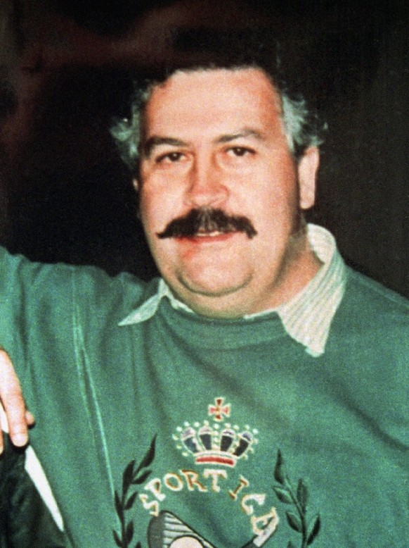 Fugitive Colombian cocaine kingpin Pablo Escobar shown, December 1991. Escobar, who escaped from a luxury jail a year ago during a bungled government attempt to transfer him to a more secure prison, h ...