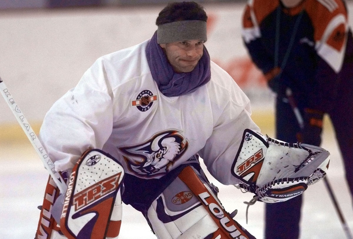 Buffalo Sabres goalie Dominik Hasek skates in full goalie equipment under the watch of his trainer, Josef Bruk, at the Pepsi Center in Amherst, N.Y., Tuesday, Jan. 18, 2000. Hasek, who suffered an inj ...