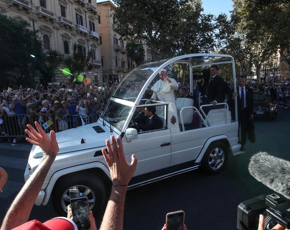 epa07023344 Pope Francis rides in papamobile in Palermo, Sicily, Italy, 15 September 2018. Pope Francis will visit Sicily, five years after his first pastoral journey to Lampedusa. The Pope will also  ...