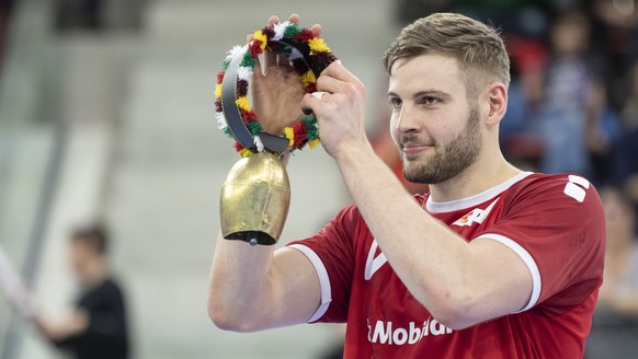 Switzerland&#039;s Samuel Roethlisberger with the most valuable player cow bell during the Yellow Cup Handball game between Switzerland and Netherlands in Switzerland, Winterthur, Sunday 05 January 20 ...
