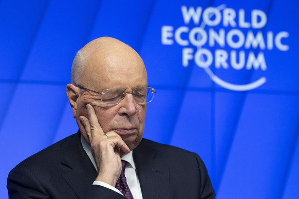 epa08966365 German Klaus Schwab, Founder and Executive Chairman of the World Economic Forum, WEF, waits prior a videoconference with German Chancellor Merkel at the Davos Agenda, in Cologny near Genev ...