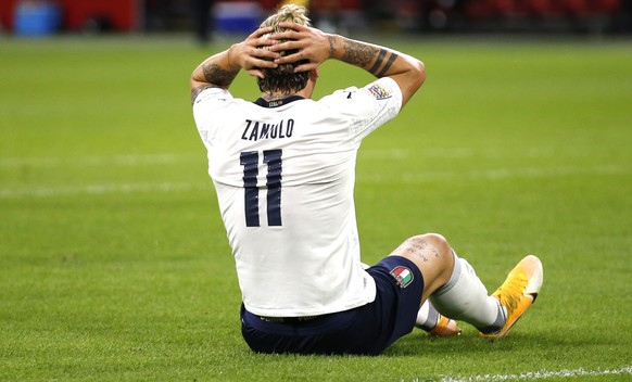 Italy&#039;s Nicolo Zaniolo reacts after missing a scoring chance during the UEFA Nations League soccer match between The Netherlands and Italy at the Johan Cruijff ArenA in Amsterdam, Netherlands, Mo ...