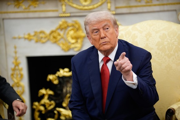 epa12405088 US President Donald Trump gestures as he meets with Turkish President Recep Tayyip Erdogan (not pictured) in the Oval Office of the White House, in Washington, DC, USA, 25 September 2025.  ...