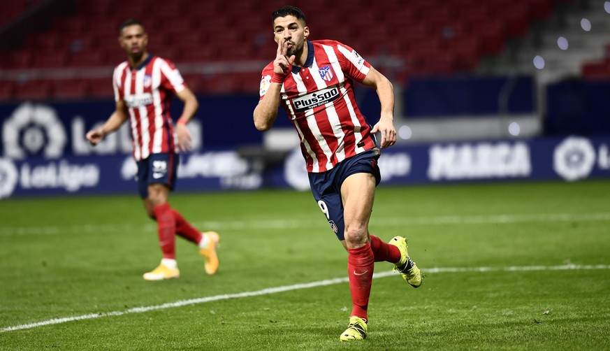 Atletico Madrid&#039;s Luis Suarez celebrates after scoring during a La Liga soccer match between Atletico Madrid and Celta at the Wanda Metropolitano stadium in Madrid, Spain, Monday, Feb. 8, 2021. ( ...