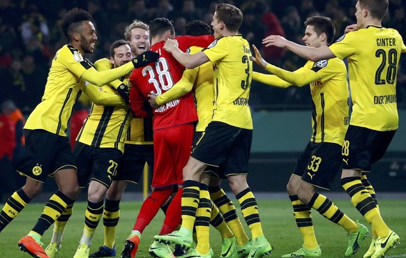 Football Soccer - Borussia Dortmund v Hertha BSC Berlin - German Cup (DFB Pokal) - Signal Iduna Park, Dortmund, Germany - 8/2/17 - Dortmund&#039;s goalkeeper Roman Buerki celebrates with team mates af ...