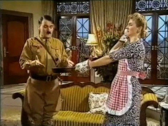 Denica Fairman and Neil McCaul in Heil Honey I'm Home! (1990)