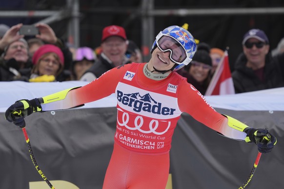 Switzerland&#039;s Marco Odermatt reacts after completing the course during an alpine ski, men&#039;s World Cup super G race, in Garmisch-Partenkirchen, Germany, Saturday, Jan. 27, 2024. (AP Photo/Gio ...